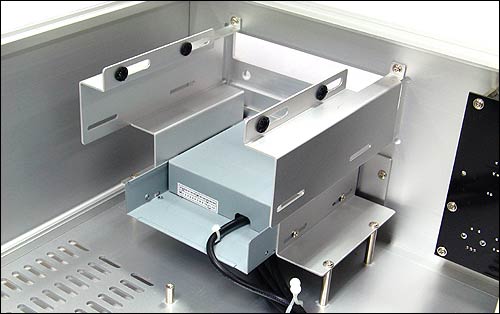 HD160 optical drive bay showing one of the four vibration-damped HDD mountings above it