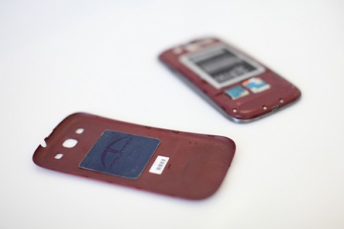 For devices with a removable battery cover, the plate can be mounted inside it